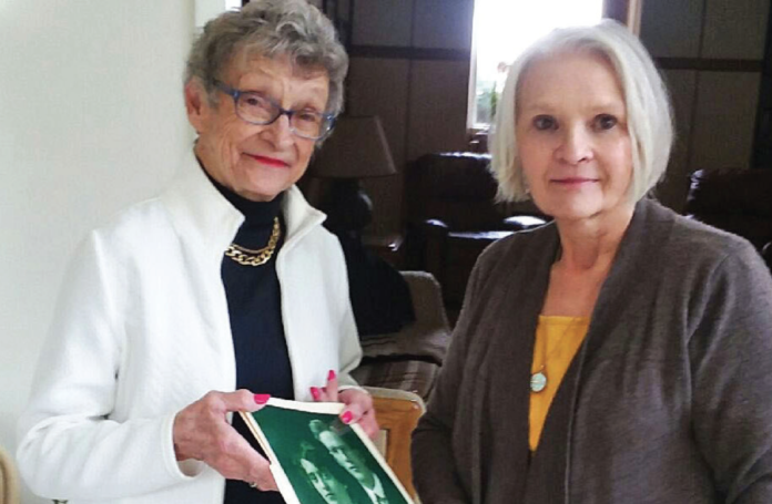 Shirley Johnson recalls her summers at the Hotel Eastin with her Aunt Marie and Uncle Lum. She is pictured holding their picture with Maryann Van Lue, who currently owns the Hotel Eastin with her husband Walt. Shirley also gave the Van Lues many other pictures to display in the hotel. Shirley Johnson recalls her summers at the Hotel Eastin with her Aunt Marie and Uncle Lum. She is pictured holding their picture with Maryann Van Lue, who currently owns the Hotel Eastin with her husband Walt. Shirley also gave the Van Lues many other pictures to display in the hotel.