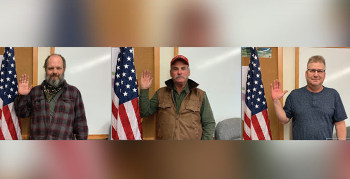 Recently-electeds, Jim Miller, Dave Sammons, and Jason Wikberg are sworn in Wednesday to serve as Trustees to the Kremmling Town Board. Miller will begin his first term, while Sammons and Wikberg were re-elected. Recently-electeds, Jim Miller, Dave Sammons, and Jason Wikberg are sworn in Wednesday to serve as Trustees to the Kremmling Town Board. Miller will begin his first term, while Sammons and Wikberg were re-elected.