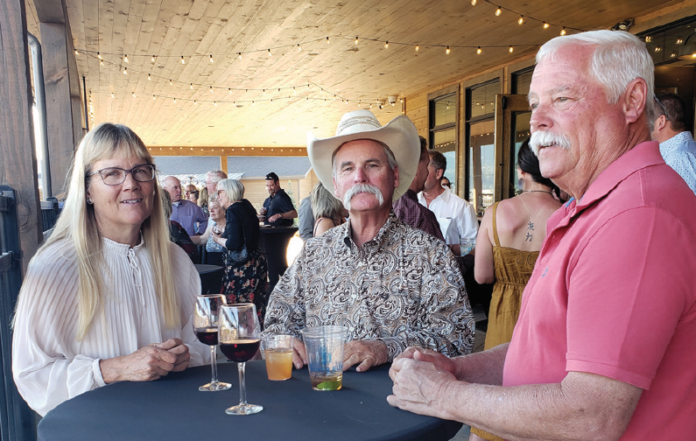 photo by Meg Soyars | Chris and Dave Sammons and WayneJohnson an evening helping the hospital.